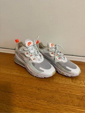 Nike White Sneakers with Mint Green Overlays and Neon Orange Accents
